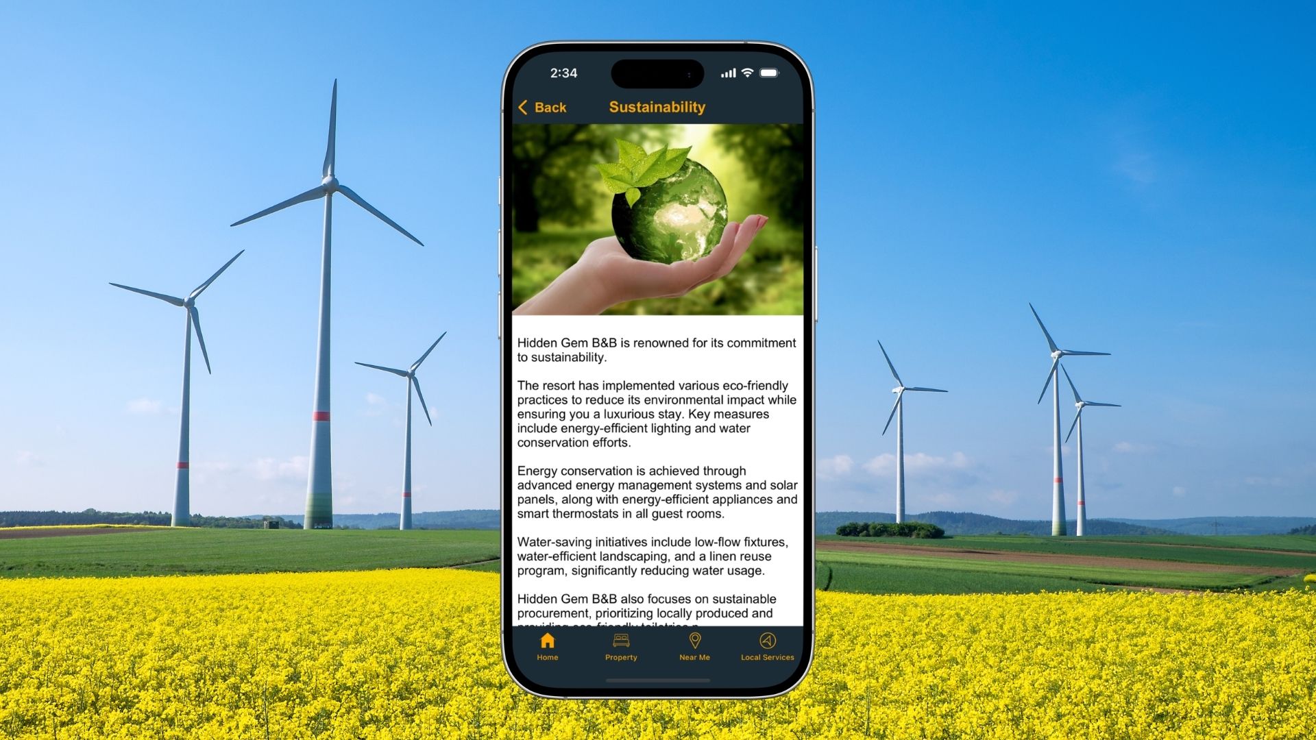 Wind Energy on Field with iPhone Showing Property's Sustainability Page